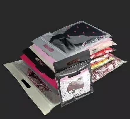 Die-cut handle non-woven fabric spliced ​​with transparent self-sealing bag